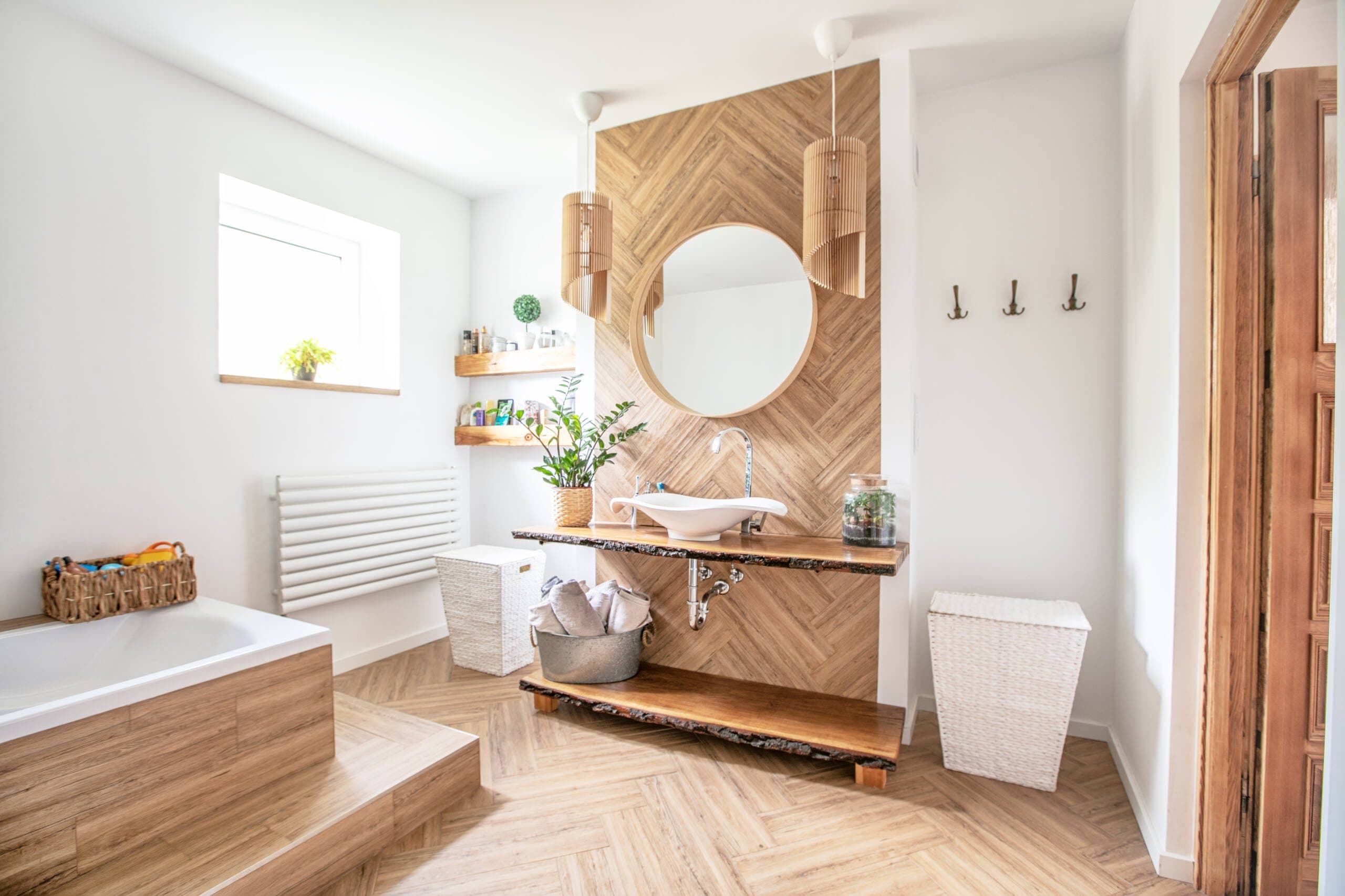 Boho-inspired bathroom remodel in Westlake, TX with natural wood tile and artisan decor