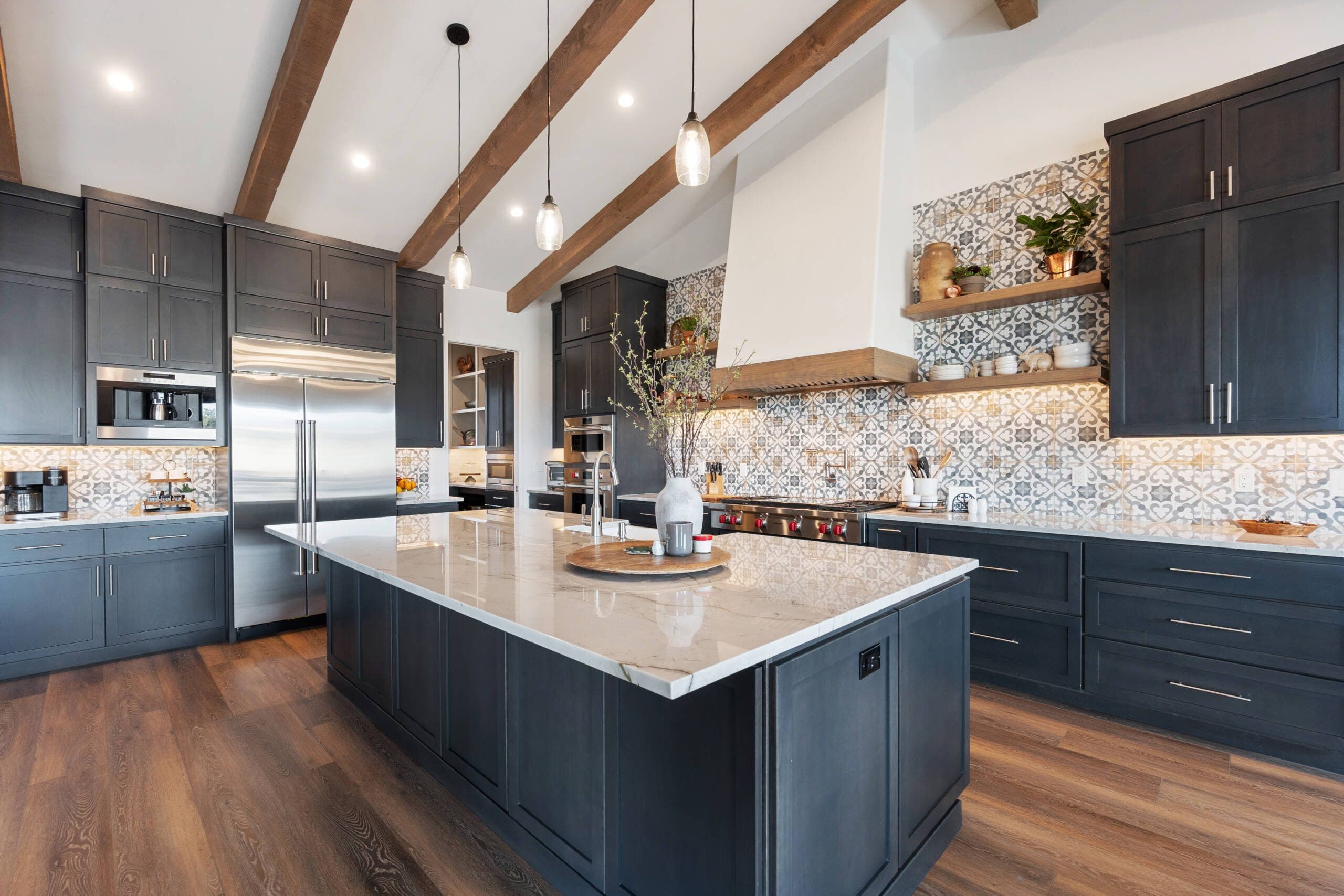 Argyle luxury kitchen remodel with deep charcoal shaker cabinets and quartz countertops