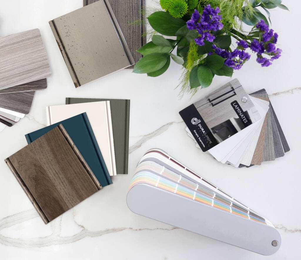 “Curated Interiors, Crafted for Life” -Southlake’s trusted luxury remodeling experts Interior designer selecting custom cabinetry and countertop samples at Compassion Construction Southlake TX