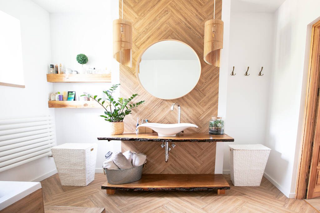 Custom wooden pendant lights in luxury boho bathroom