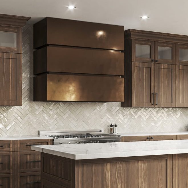 Range Hood Elegance -Southlake’s trusted luxury remodeling experts Handcrafted Range Hood with Decorative Rivets and Straps Southlake