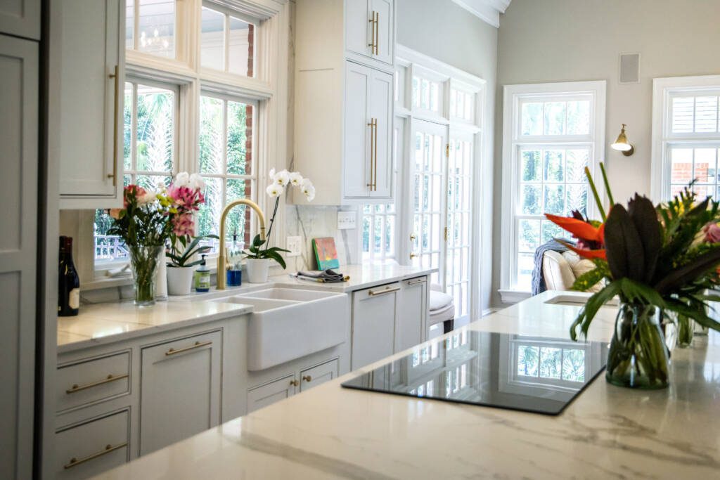 Luxury kitchen remodel Colleyville TX with quartz island and brass hardware