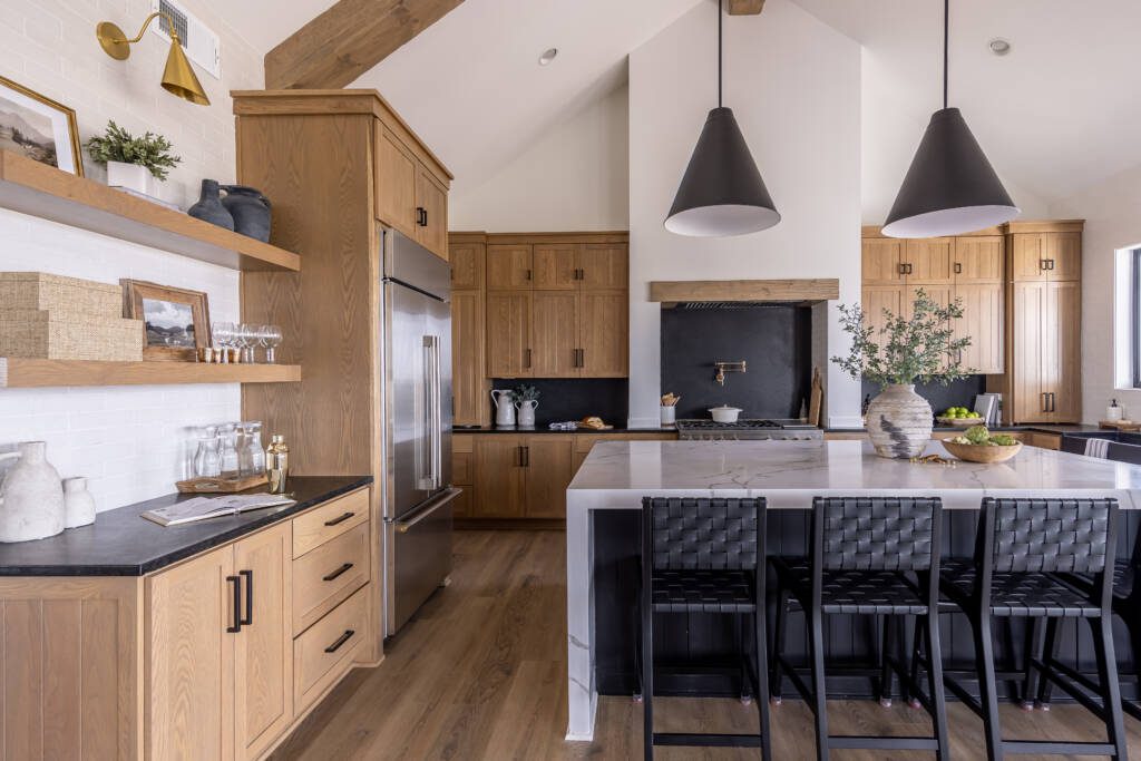 Rustic Elegance Meets Modern Functionality -Southlake’s trusted luxury remodeling experts Southlake luxury kitchen remodel with white oak cabinetry and matte black quartz countertops