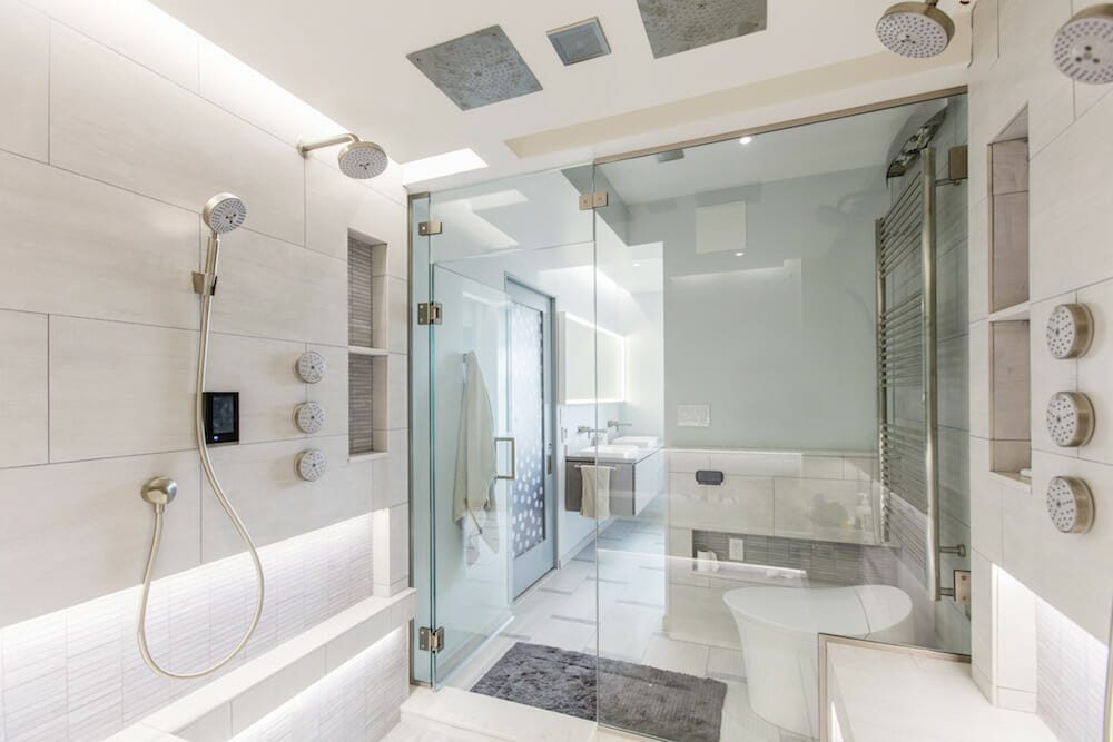 Showers -Southlake’s trusted luxury remodeling experts Luxury frameless glass shower with marble walls Southlake TX